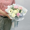 small bouquet of pink,white roses,white gerbera daisy & other side fillers in white wrapping